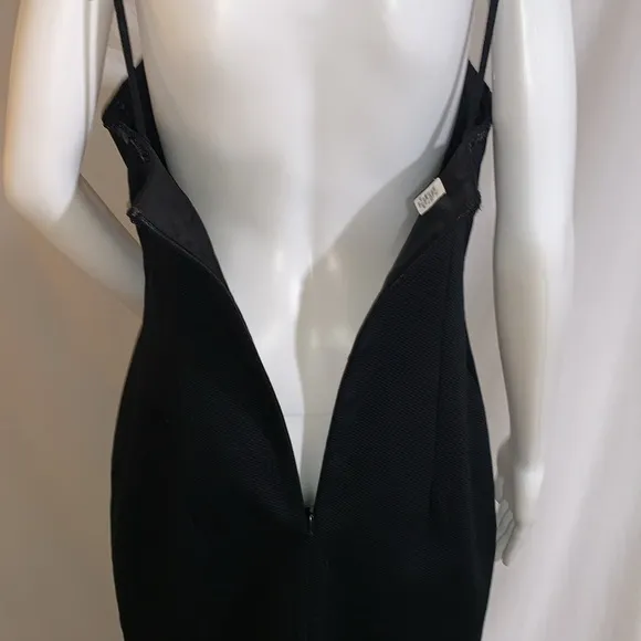 Gorgeous classic, shapely lined black dress, like new! Size 8