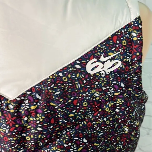 Nike 6.0 floral puffer vest. Like new. Small. florals w/cream accents EUC