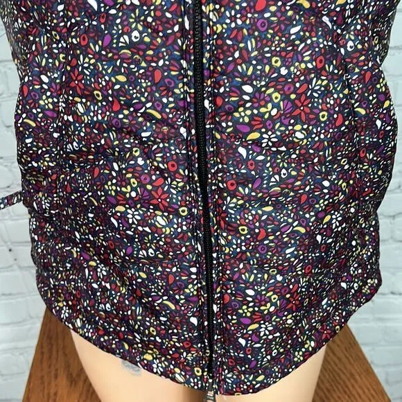 Nike 6.0 floral puffer vest. Like new. Small. florals w/cream accents EUC