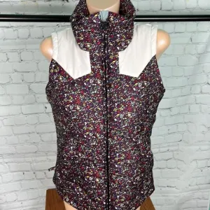 Nike 6.0 floral puffer vest. Like new. Small. florals w/cream accents EUC