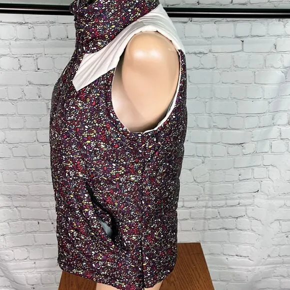Nike 6.0 floral puffer vest. Like new. Small. florals w/cream accents EUC
