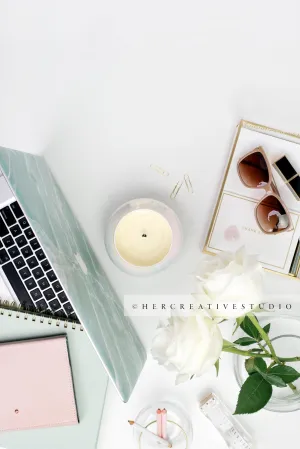 Notebooks on Laptop Flatlay
